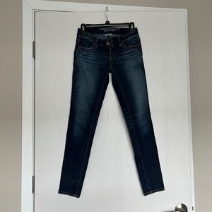 American eagle dark wash jeans, super stretch jegging, size 0.